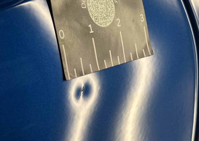 Discover the Benefits of Paintless Dent Repair: Stunning Results for a 2024 Camaro 8 1 Inch dent in Camaro Door