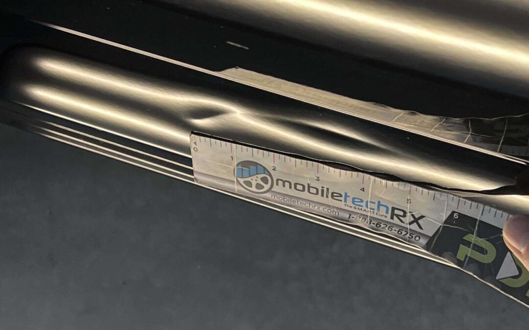 Crease Dent Repair Using Paintless Dent Removal on a Ford F150 Truck Door