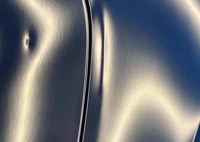 Discover the Benefits of Paintless Dent Repair: Stunning Results for a 2024 Camaro 6 Door Dent Damages to a 2024 Camaro