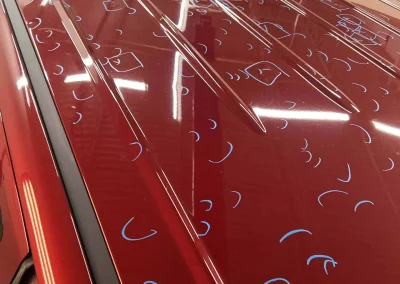 Marking over 200 hail dents in truck roof