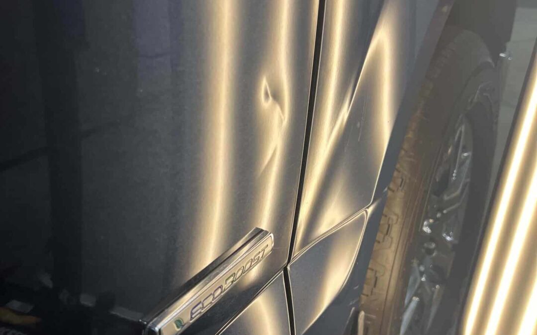 Paintless Dent Repair Restores This Truck Door After Bike Impact