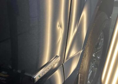 Paintless Dent Repair Restores This Truck Door After Bike Impact