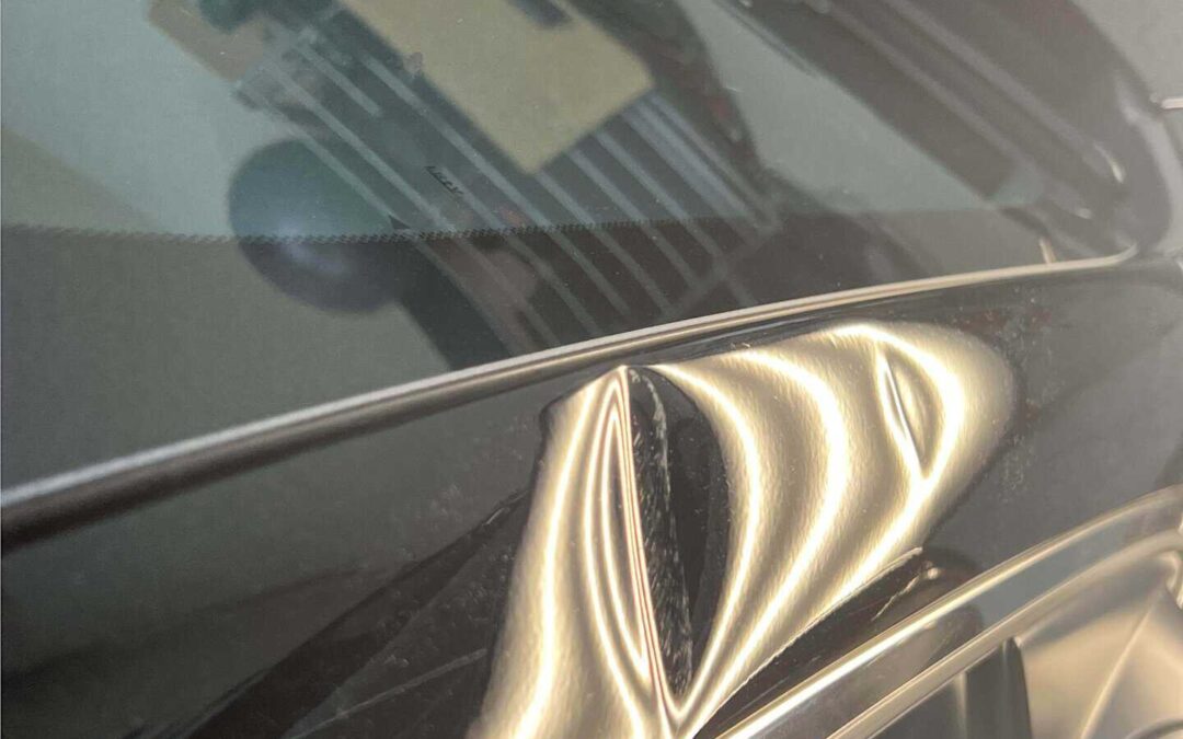 Storm Damage Repair: Solutions For Vehicle Dents and Windshield Replacement